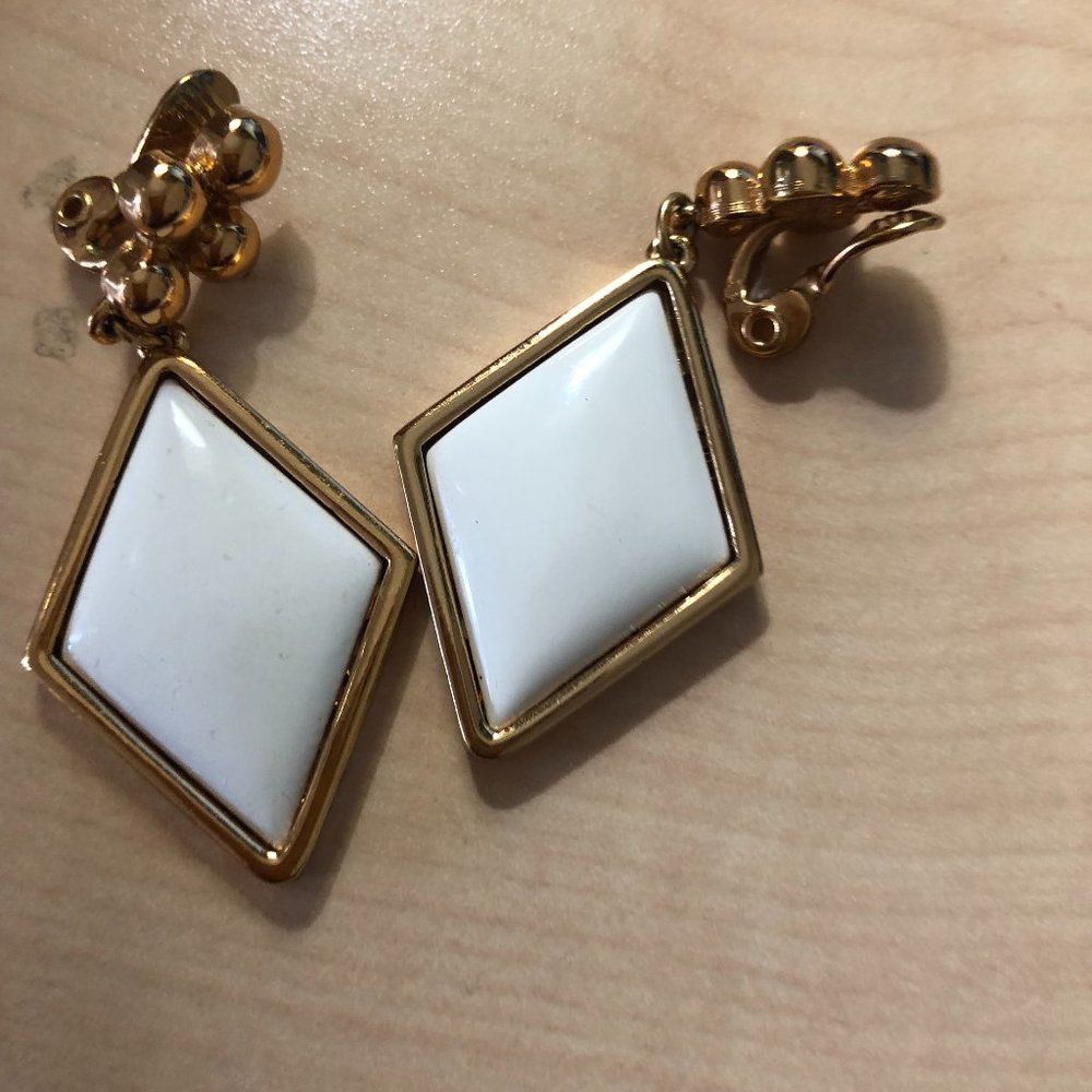 Vintage Trifari white enamel kite shaped clip on earrings